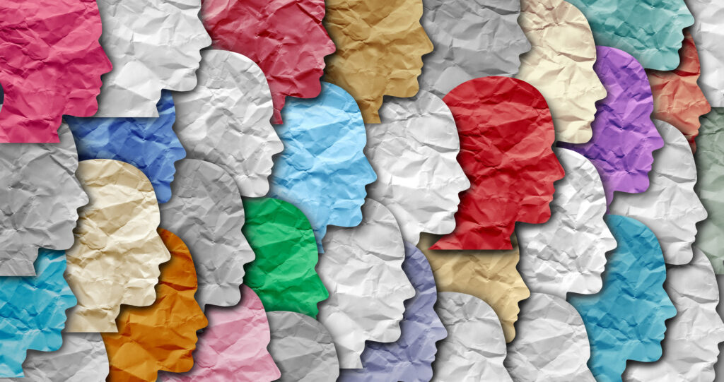 A drawing of many different coloured heads